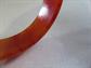 Vintage Bakelite Bangle Bracelet Swirled Flame Blood Orange Costume Jewelry