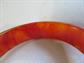 Vintage Bakelite Bangle Bracelet Swirled Flame Blood Orange Costume Jewelry