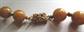 Vintage Bakelite Dark Mustard Swirl Necklace 