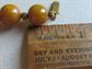 Vintage Bakelite Dark Mustard Swirl Necklace 