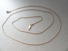 14k Gold Fine Chain Has Two Knots 0.5 Grams Fine Jewelry