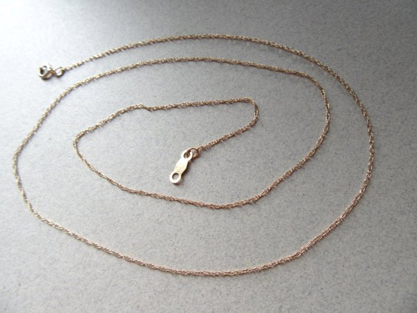 14k Gold Fine Chain Has Two Knots 0.5 Grams Fine Jewelry
