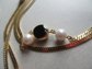 Snakey Gold Tone Mesh Black Lucite and Faux Pearl Long Necklace