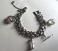Vintage Hearts Charm Bracelet Articulated Roulette Wheel Charm Austria and Sterling Hour Glass Charm AS IS Destash