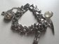 Vintage Hearts Charm Bracelet Articulated Roulette Wheel Charm Austria and Sterling Hour Glass Charm AS IS Destash